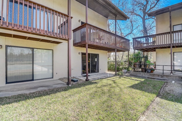 rear view of property with a yard