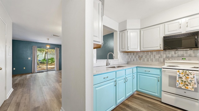 kitchen featuring blue cabinetry, sink, white cabinets, and white electric range oven