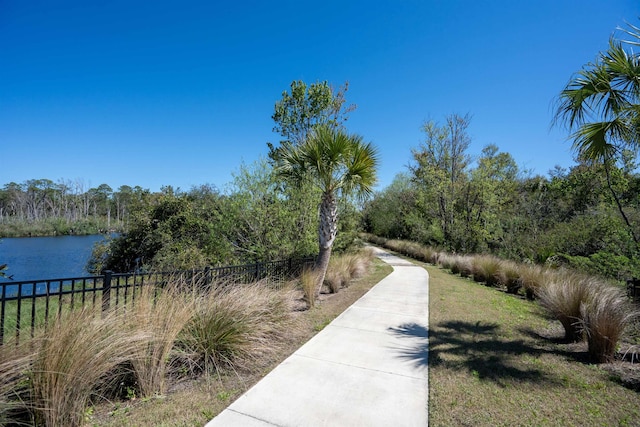 638 Honeycomb Trl, Saint Augustine, FL 32095 - view of home's community with a water view, fence, and a forest view