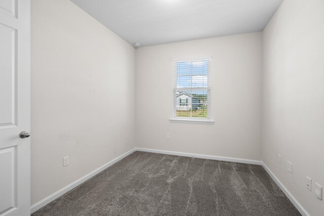 638 Honeycomb Trl, Saint Augustine, FL 32095 - carpeted empty room featuring baseboards