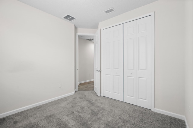 638 Honeycomb Trl, Saint Augustine, FL 32095 - unfurnished bedroom featuring baseboards, visible vents, and carpet flooring
