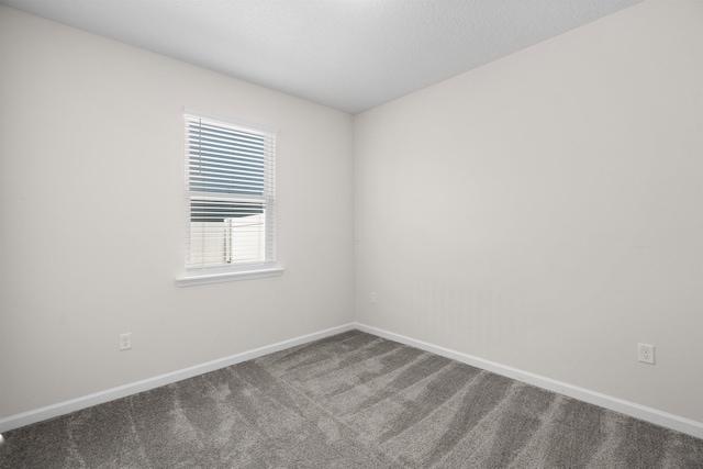 638 Honeycomb Trl, Saint Augustine, FL 32095 - empty room featuring carpet floors and baseboards