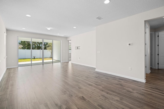 638 Honeycomb Trl, Saint Augustine, FL 32095 - empty room with baseboards, wood finished floors, and recessed lighting