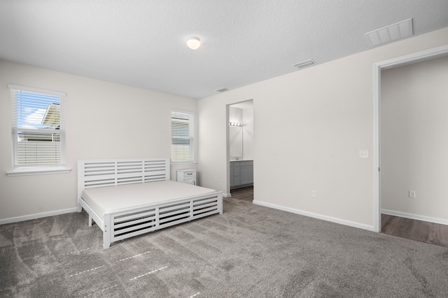638 Honeycomb Trl, Saint Augustine, FL 32095 - unfurnished bedroom featuring baseboards, carpet flooring, and visible vents