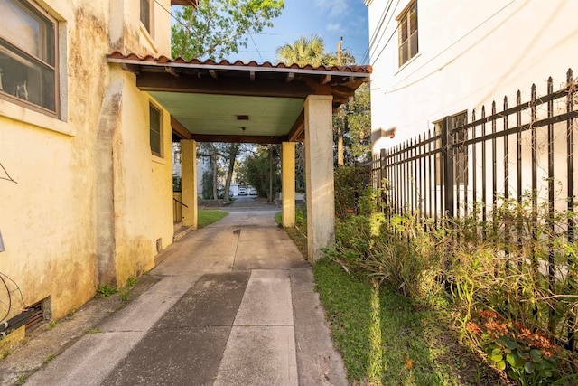 view of patio / terrace with a carport