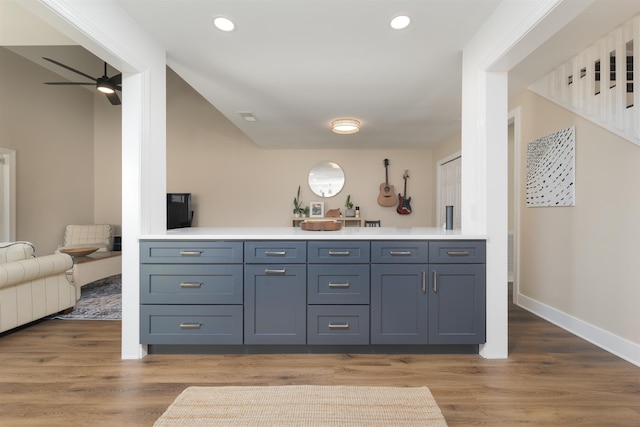 bar featuring recessed lighting, ceiling fan, light wood-type flooring, and baseboards