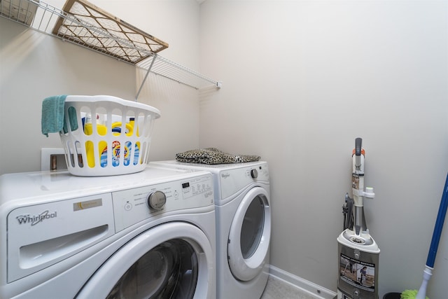 laundry room featuring washer and clothes dryer