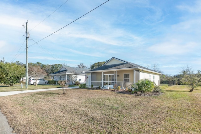 view of front of house featuring a front yard and a porch