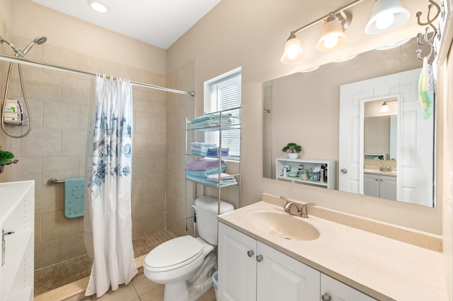 bathroom featuring vanity, tile patterned floors, curtained shower, and toilet