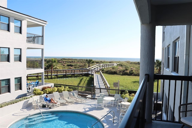 pool featuring a patio area