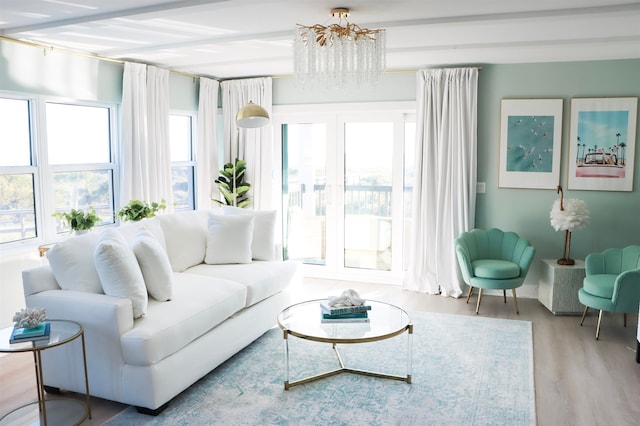 sunroom with a chandelier