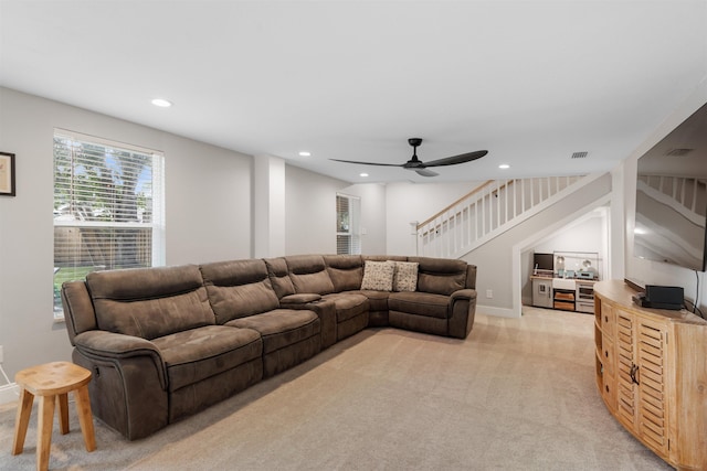 214 Deltona Blvd, Saint Augustine, FL 32086 - living room with stairway, light carpet, a ceiling fan, and recessed lighting