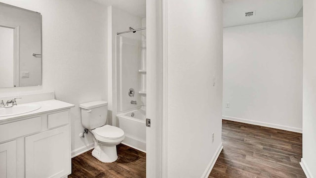 full bathroom featuring toilet, vanity, tub / shower combination, and hardwood / wood-style flooring