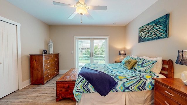 bedroom featuring a closet, ceiling fan, light hardwood / wood-style flooring, and access to outside