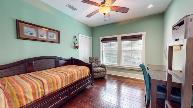 bedroom featuring dark hardwood / wood-style floors and ceiling fan