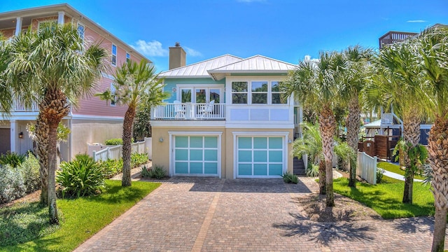 coastal home with a balcony