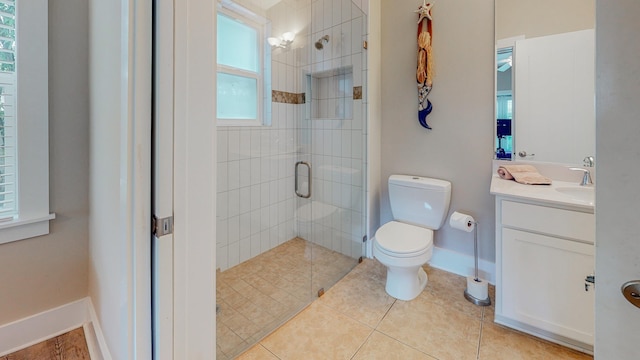 bathroom with walk in shower, toilet, tile patterned floors, and vanity