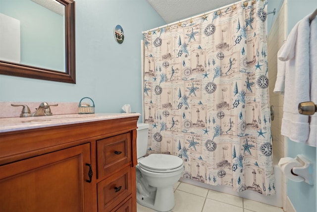 bathroom featuring tile patterned flooring, a shower with shower curtain, vanity, a textured ceiling, and toilet