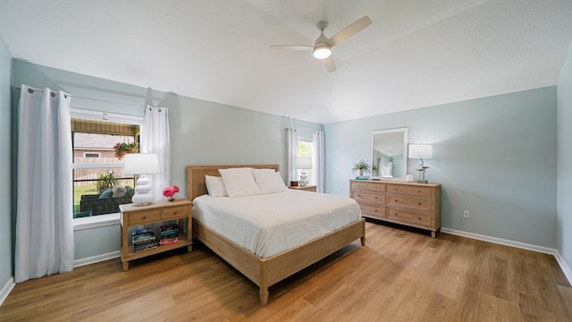 2020 Spring Meadows Ct, Saint Augustine, FL 32092 - bedroom with vaulted ceiling, light wood-type flooring, multiple windows, and baseboards