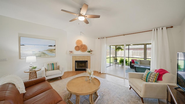 2020 Spring Meadows Ct, Saint Augustine, FL 32092 - living area featuring vaulted ceiling, a fireplace, ceiling fan, wood finished floors, and baseboards