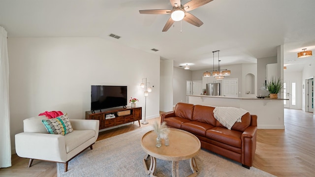 2020 Spring Meadows Ct, Saint Augustine, FL 32092 - living area featuring baseboards, a ceiling fan, and lofted ceiling