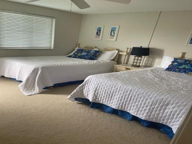 bedroom featuring carpet flooring and ceiling fan