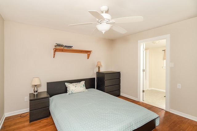 bedroom featuring hardwood / wood-style flooring and ceiling fan