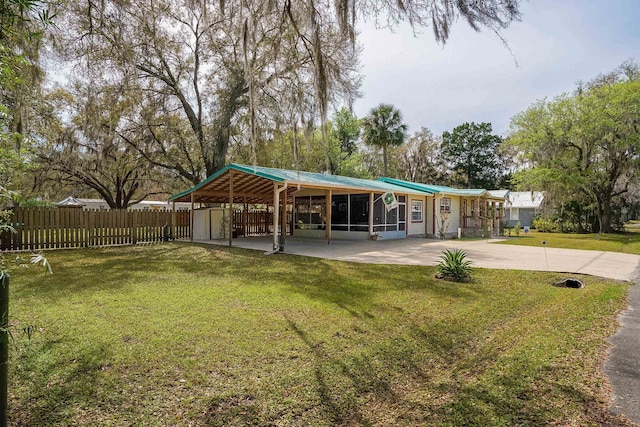 view of property's community with a yard