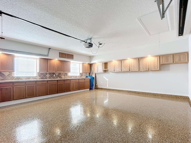 kitchen with backsplash and a textured ceiling