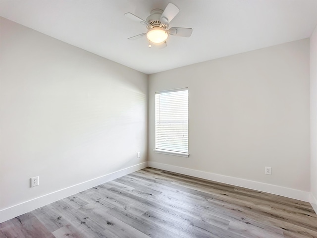 unfurnished room with light hardwood / wood-style flooring and ceiling fan