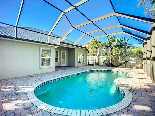 view of pool featuring a lanai and a patio area