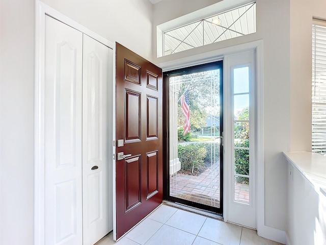 entrance foyer featuring light tile patterned floors