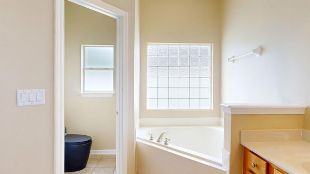 256 N Hidden Tree Dr, Saint Augustine, FL 32086 - full bathroom with a garden tub, vanity, tile patterned flooring, and toilet