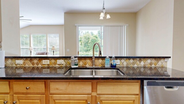 256 N Hidden Tree Dr, Saint Augustine, FL 32086 - kitchen with dishwasher, a sink, decorative backsplash, and plenty of natural light