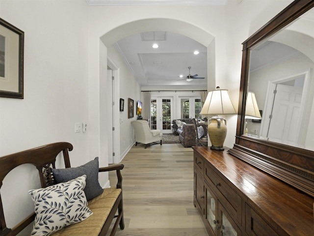 476 Ocean Forest Dr, Saint Augustine, FL 32080 - corridor featuring crown molding, light wood-style floors, recessed lighting, french doors, and arched walkways
