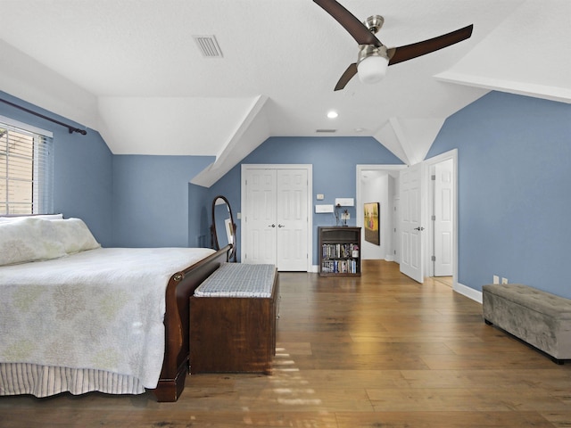 476 Ocean Forest Dr, Saint Augustine, FL 32080 - bedroom with visible vents, baseboards, wood finished floors, and vaulted ceiling