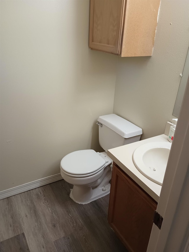 304 Las Olas Rd, Saint Augustine, FL 32084 - half bath featuring vanity and wood finished floors