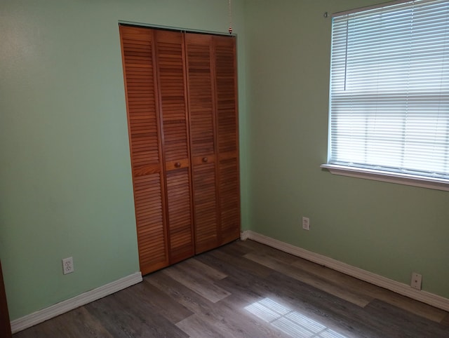 304 Las Olas Rd, Saint Augustine, FL 32084 - unfurnished bedroom featuring a closet and wood finished floors