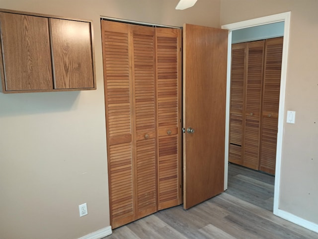 304 Las Olas Rd, Saint Augustine, FL 32084 - unfurnished bedroom with light wood finished floors, a closet, and ceiling fan