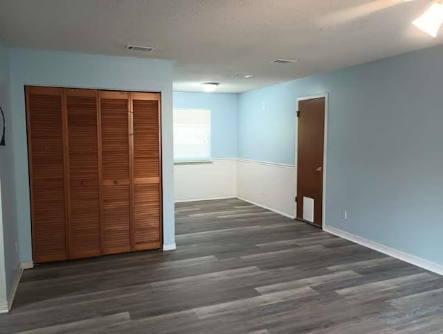 304 Las Olas Rd, Saint Augustine, FL 32084 - unfurnished bedroom featuring wood finished floors and a closet