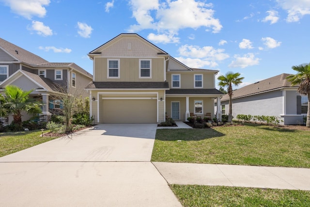 811 Sandstone Dr, Saint Augustine, FL 32086 - view of front of house with a garage, covered porch, concrete driveway, and a front yard