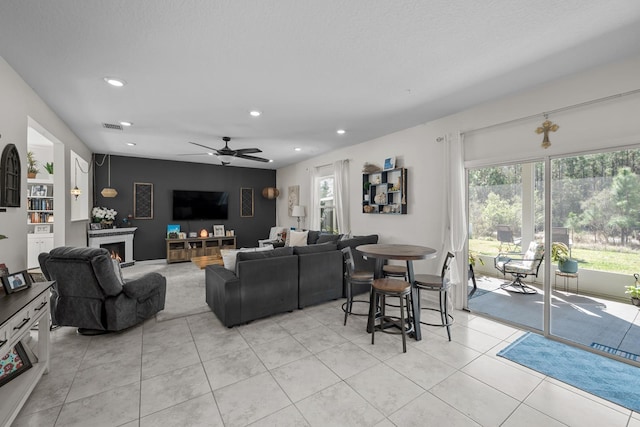 811 Sandstone Dr, Saint Augustine, FL 32086 - living area with light tile patterned flooring, visible vents, a healthy amount of sunlight, and recessed lighting