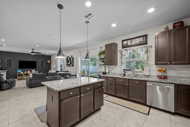 811 Sandstone Dr, Saint Augustine, FL 32086 - kitchen featuring stainless steel dishwasher, dark brown cabinets, visible vents, and a sink
