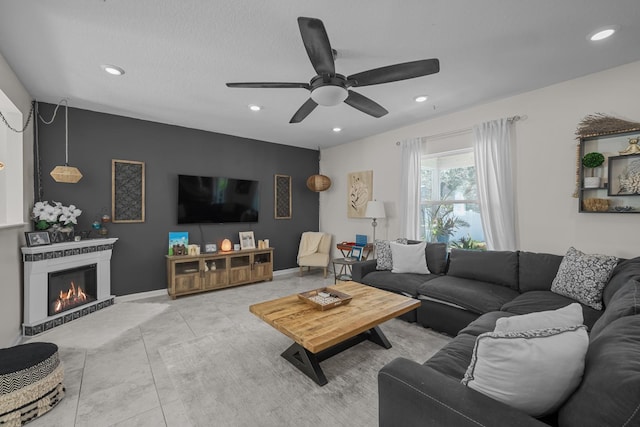811 Sandstone Dr, Saint Augustine, FL 32086 - living room with a glass covered fireplace, recessed lighting, baseboards, and ceiling fan