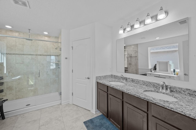 811 Sandstone Dr, Saint Augustine, FL 32086 - full bath with visible vents, a stall shower, and a sink