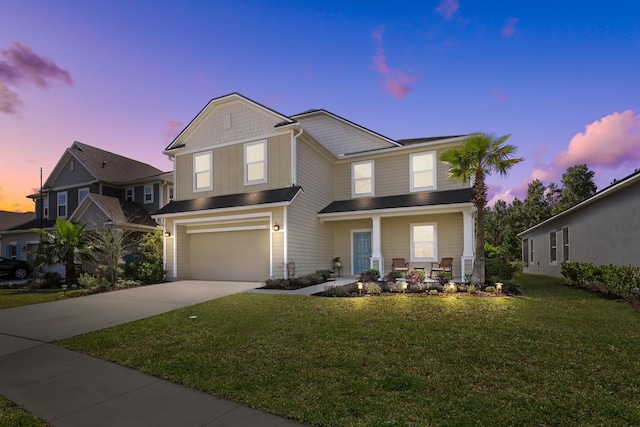 811 Sandstone Dr, Saint Augustine, FL 32086 - view of front of property featuring driveway, an attached garage, covered porch, a front lawn, and board and batten siding
