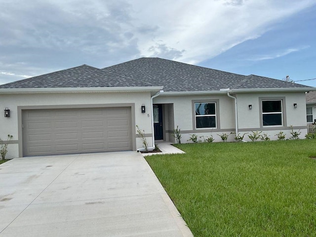 5 Fifer Ln, Palm Coast, FL 32137 - single story home with stucco siding, driveway, a garage, a front lawn, and roof with shingles