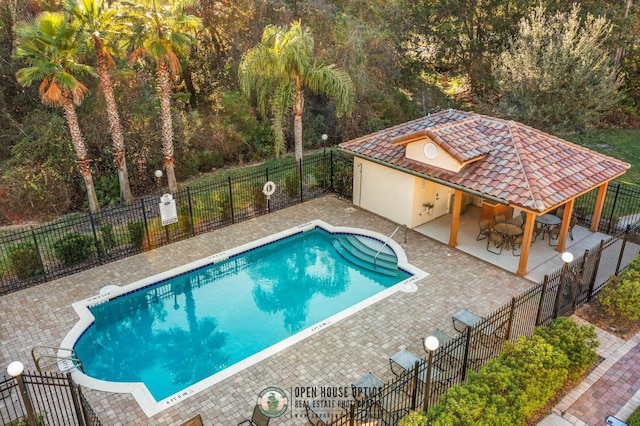 121 Grand Ravine Dr, Saint Augustine, FL 32086 - community pool featuring a patio
