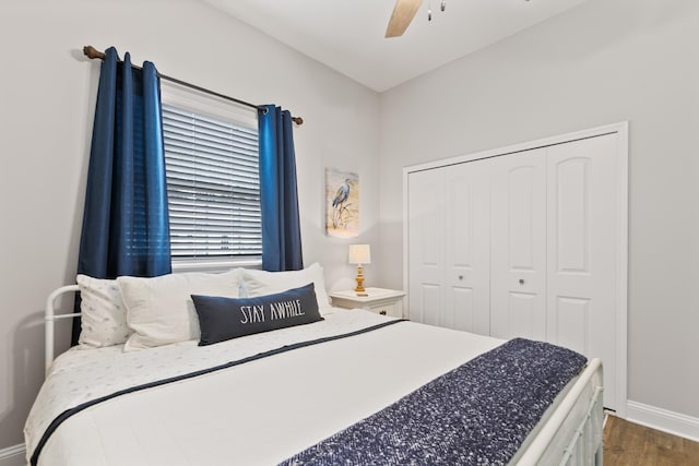 121 Grand Ravine Dr, Saint Augustine, FL 32086 - bedroom featuring dark wood-style floors, baseboards, a closet, and ceiling fan