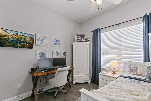 121 Grand Ravine Dr, Saint Augustine, FL 32086 - bedroom featuring wood finished floors, a desk, baseboards, and a ceiling fan